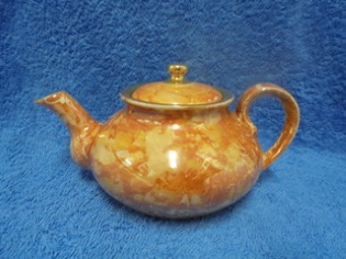 Arabia, pieni oranssi teekannu, Kirjo, loistomarmori/kultaus, A710