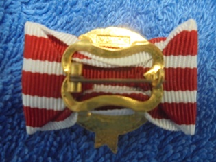 Sotainvalidien Veljesliiton kullattu ansiomerkki, R942
