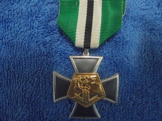 Sotilaspoikaristi, R495