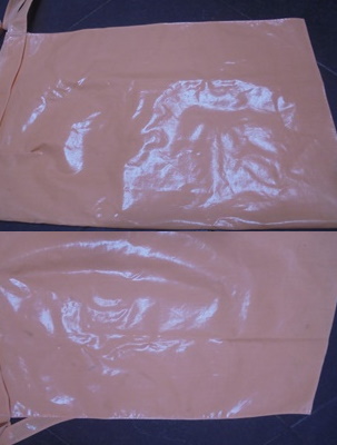 Oranssi muovinen esiliina, V989