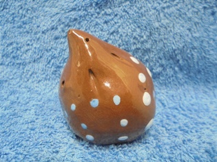 Ruskea pilkullinen savipilli, Siili, E616