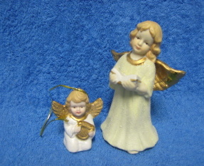 Kultakoristeiset enkelit, E110