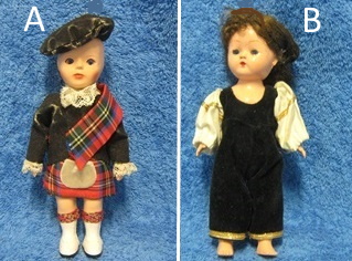 Vanha pieni nukke, Skontlantilais- asuinen tai haalariasuinen tyttö, E173