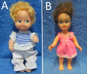 Pieni nukke, vaaleahiuksinen vauvanukke tai ruskeahiuksinen tyttnukke, E369